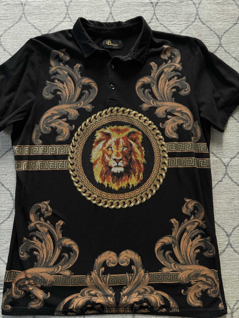 Men's Black Lion Emblem Polo with Ornate Scroll Detail